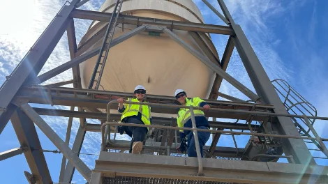 Viterra employees, Annelise Sorell and William Read loading the first train at Snowtown with 2024/25 season wheat. Annelise Sorell and William Read_first train Snowtown (1).jpeg