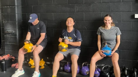 Eric Lee, Bunge Analyst II Merchandising (centre), participating in the Fat Farmers Adelaide Friday morning sessions..png