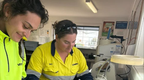 (L – R) Viterra employees Katerin Romero and Macy Richman classifying the first ever delivery of lentils at Thevenard Katerin Romero and Macy Richman classifying Thev first ever lentil delivery_web.jpg