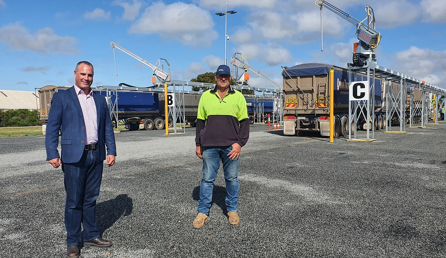 Viterra Western region Operations Manager Nick Pratt with Strategic Site Committee Chair Mick Dahlitz in front of the new infrastructure at Cummins. 201105 news.jpg