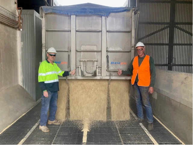 Viterra employee Ian McGowan (left) with grower Tyson Paech. Viterra employee Ian McGowan (left) with grower Tyson Paech.