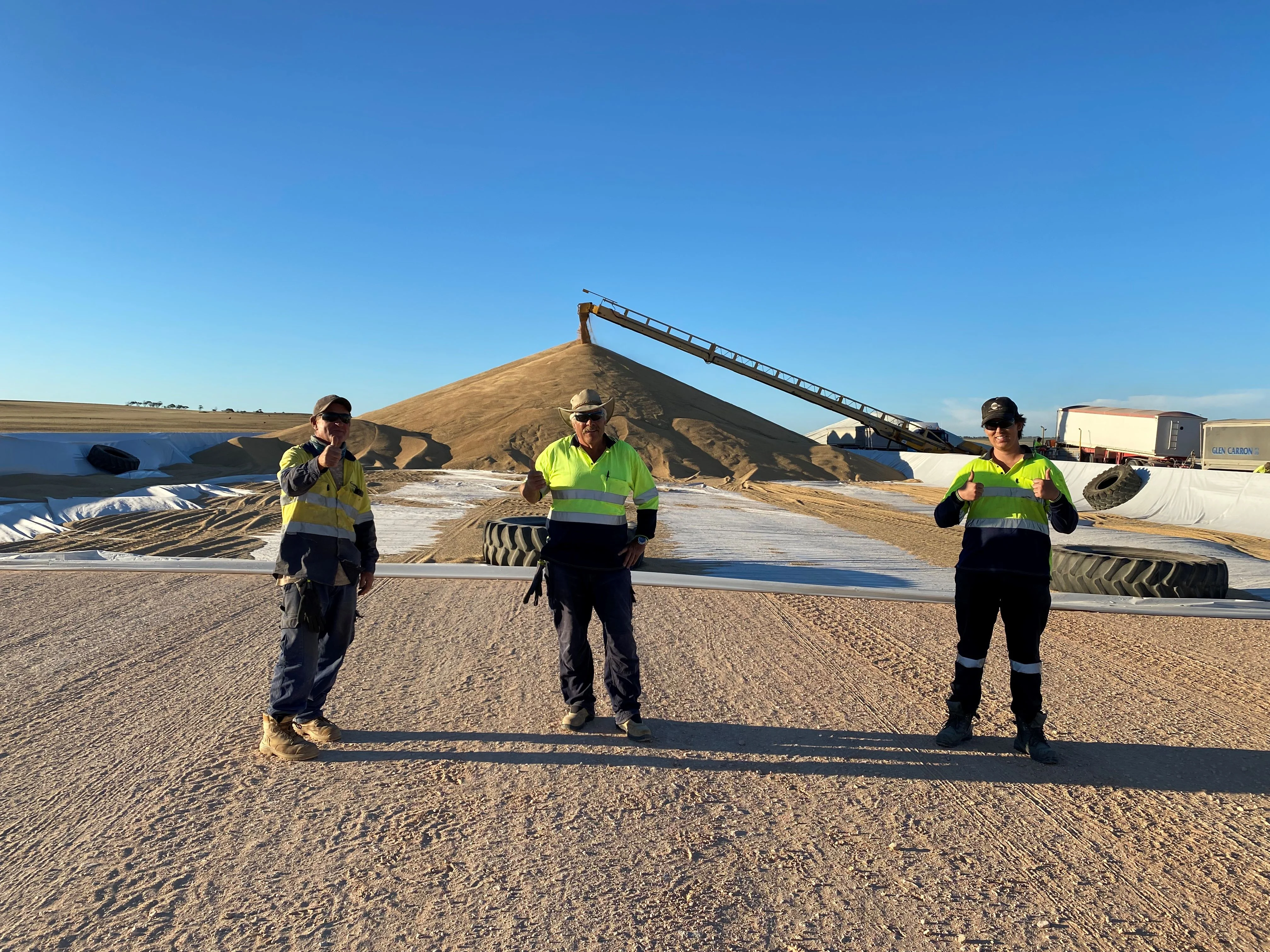 Viterra Wudinna employees (L-R) Graham Walters, Paul Young and Elijah Oswald celebrating their record breaking day of receivals 211207 WUD Record.jpg